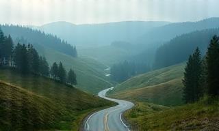 Road trip landscape from Czechia to Slovakia with rolling hills and roads